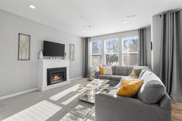 living room featuring light colored carpet