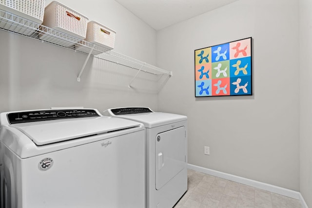 laundry area with washer and clothes dryer