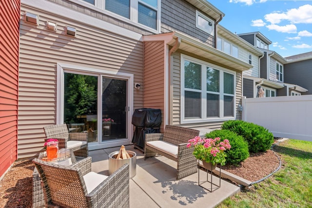 view of patio featuring an outdoor fire pit and area for grilling