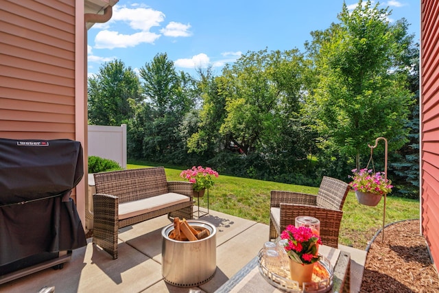 view of patio with a grill and outdoor lounge area