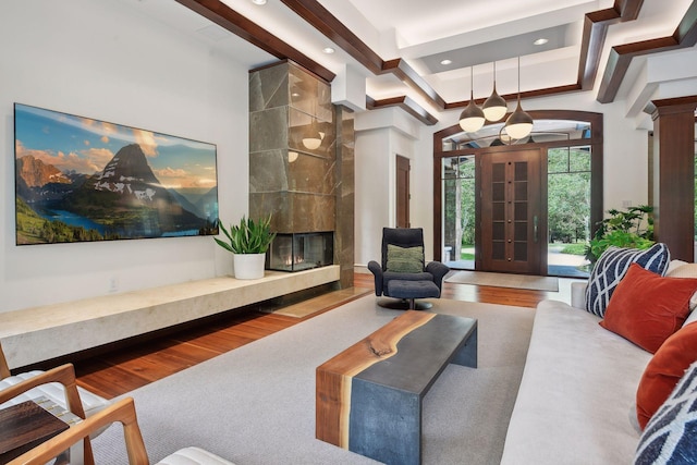 common area with beamed ceiling and recessed lighting