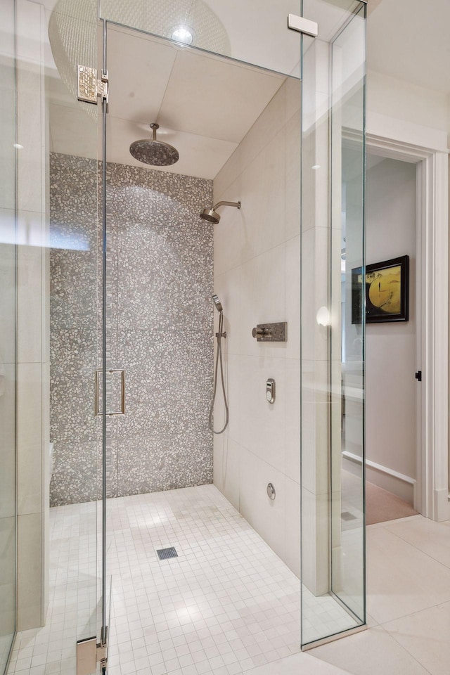full bath with tile patterned flooring and a stall shower