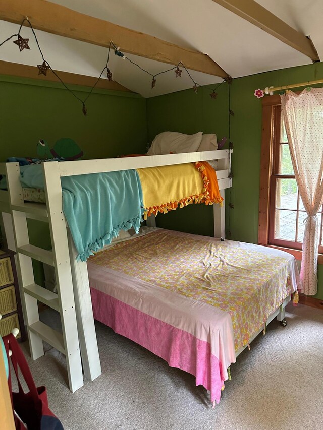 27068 Greenwood Isle Cir, Bay Lake Twp, MN 56444 - carpeted bedroom featuring lofted ceiling with beams