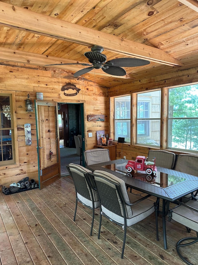 dining area with wood ceiling, ceiling fan, hardwood / wood-style floors, and beam ceiling