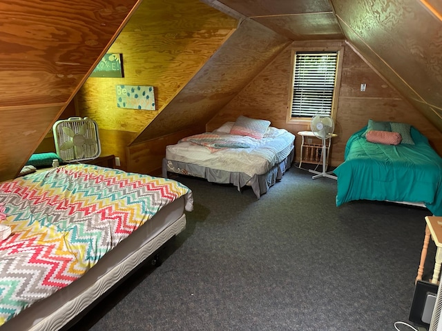 carpeted bedroom with vaulted ceiling