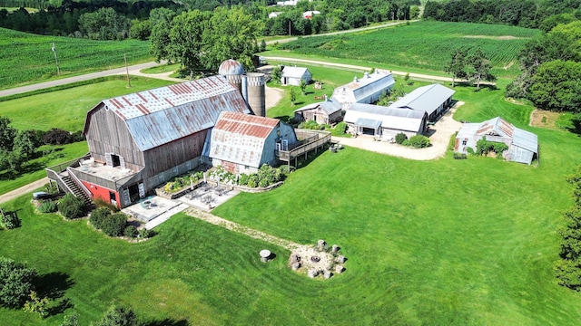 birds eye view of property featuring a rural view