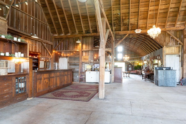 miscellaneous room with high vaulted ceiling