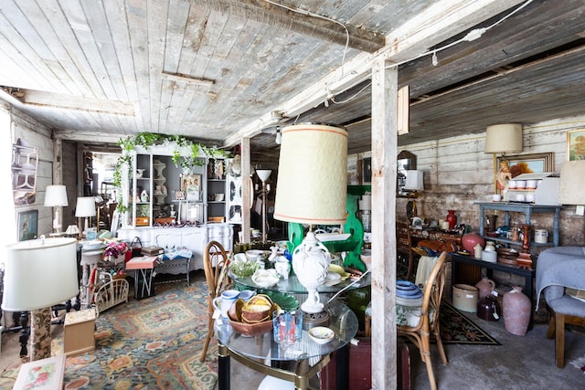 dining space featuring concrete flooring