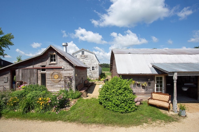 exterior space with an outbuilding