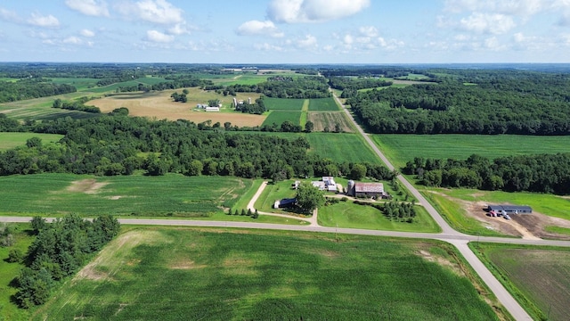 birds eye view of property featuring a rural view