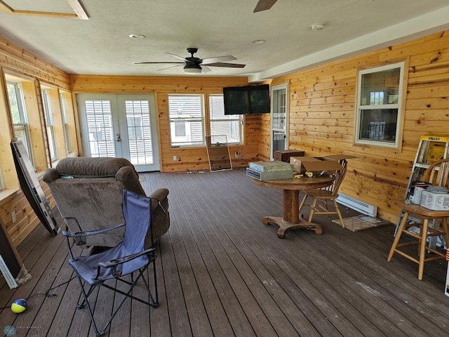 wooden terrace featuring ceiling fan