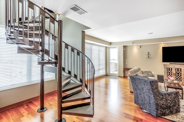 interior space with hardwood / wood-style flooring