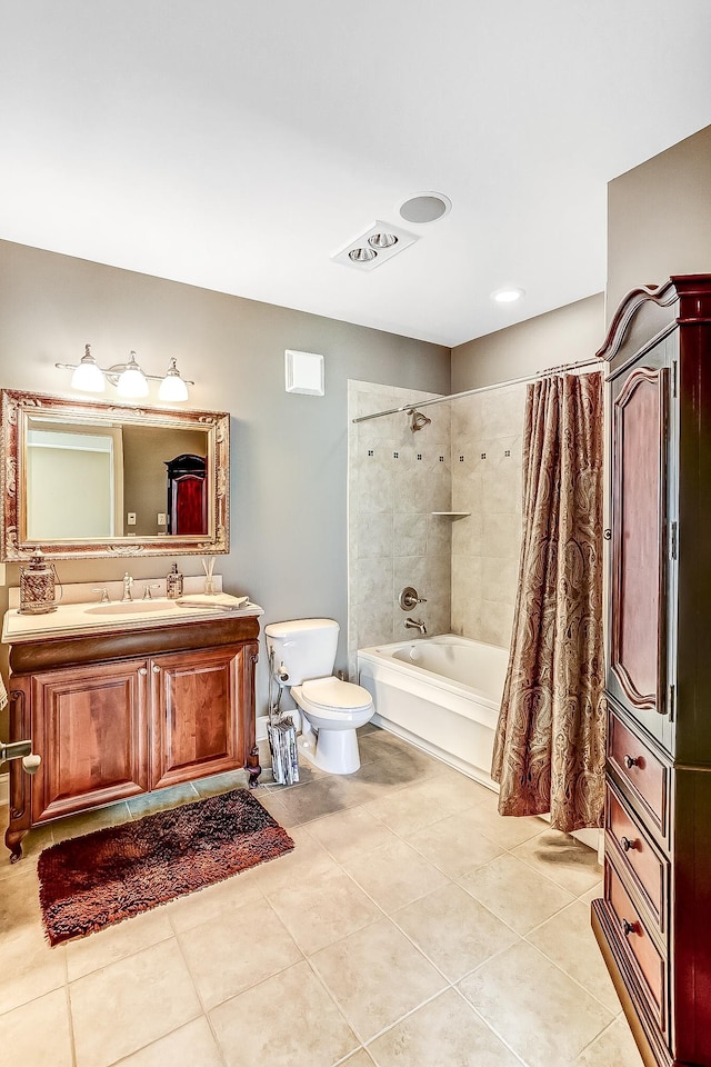 full bathroom featuring shower / tub combo with curtain, vanity, tile patterned flooring, and toilet