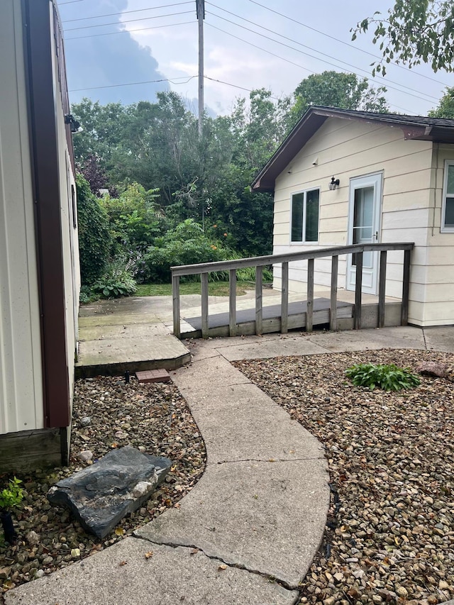 view of yard featuring a wooden deck