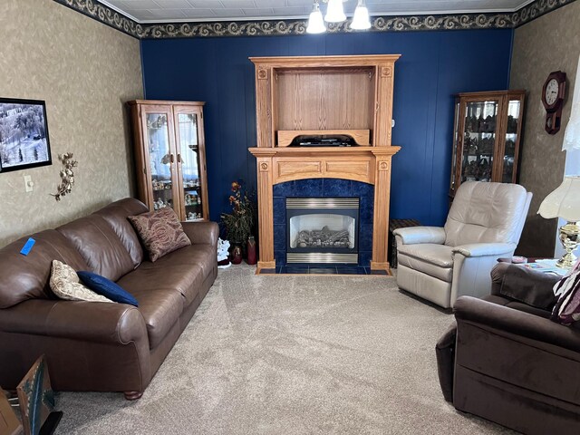 living room with carpet flooring and a fireplace