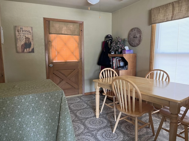 dining area featuring a ceiling fan