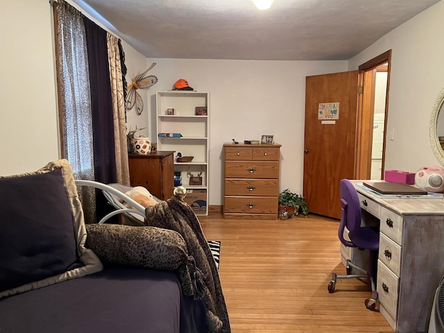 bedroom featuring light wood-type flooring