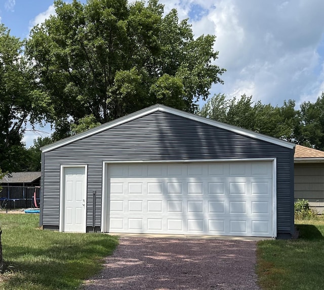detached garage with fence