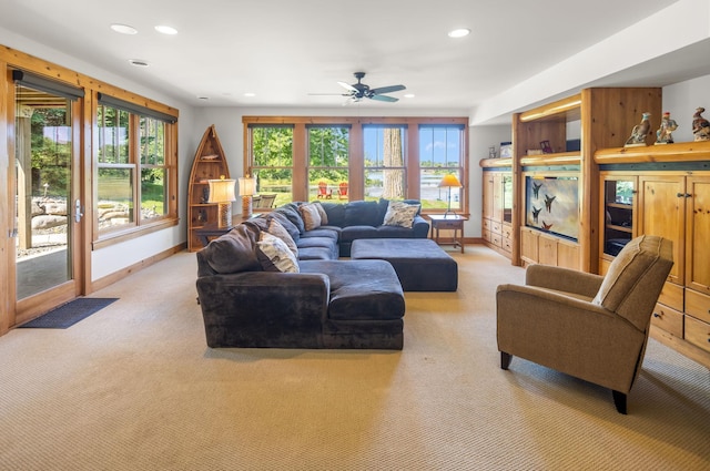 living area with recessed lighting and baseboards