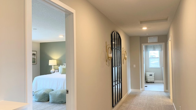 1634 Oak Creek Dr, Chaska, MN 55318 - hallway with light colored carpet and attic access
