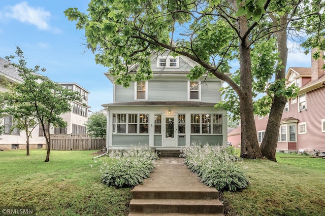 view of front of house with a front lawn