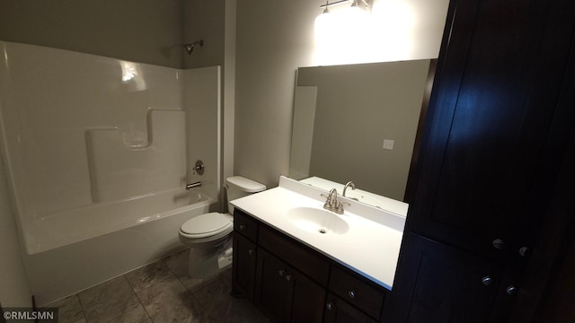 full bathroom with tile patterned floors, vanity, washtub / shower combination, and toilet