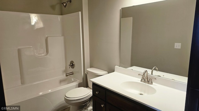 full bathroom with vanity, toilet, and bathtub / shower combination