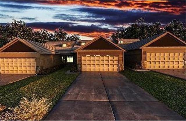 ranch-style home with a garage