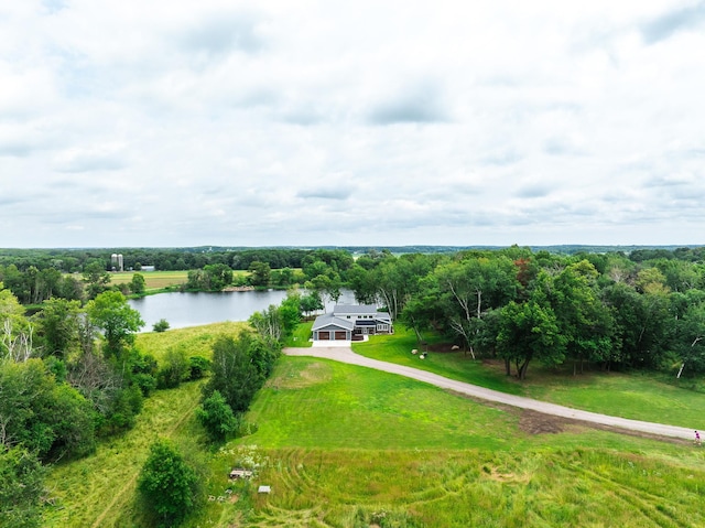 aerial view with a rural view and a water view