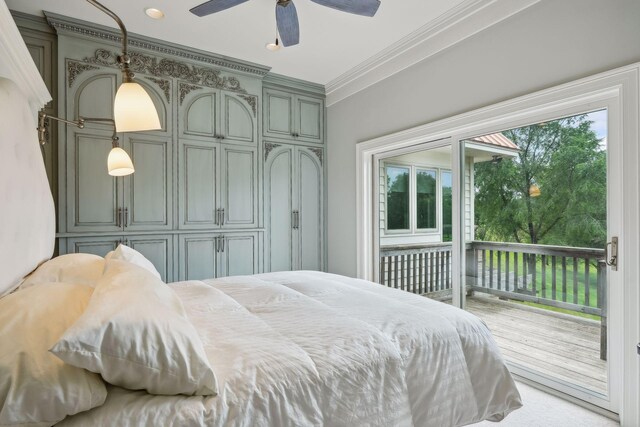 bedroom with ceiling fan and crown molding