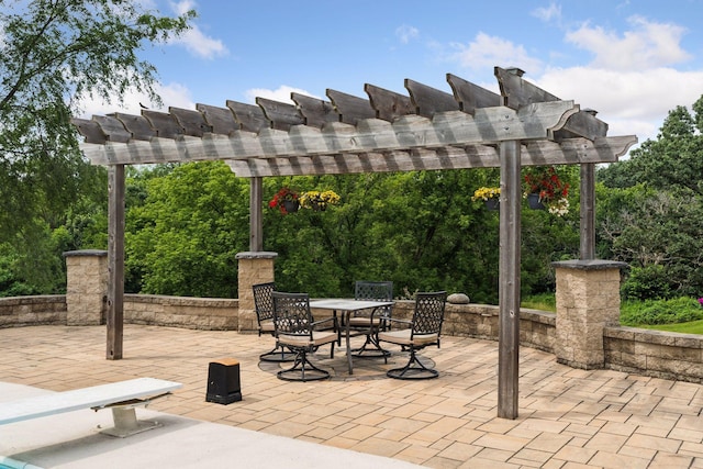 view of patio featuring a pergola