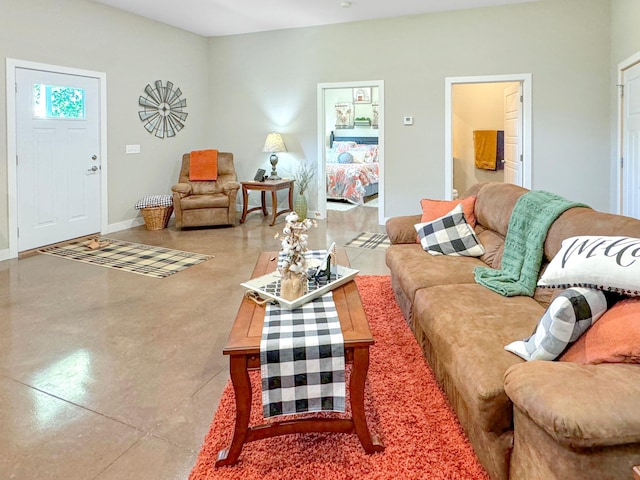 living room with tile patterned floors