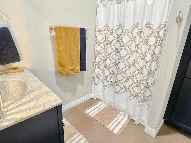 109 Kelsey Ln, Slayton, MN 56172 - bathroom featuring baseboards, vanity, and a shower with curtain