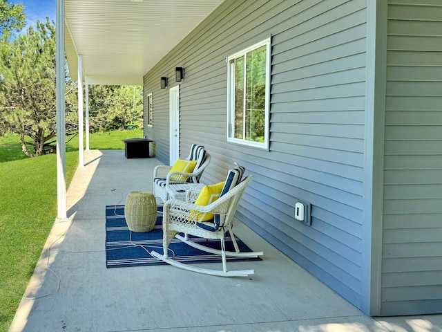109 Kelsey Ln, Slayton, MN 56172 - view of patio / terrace with covered porch