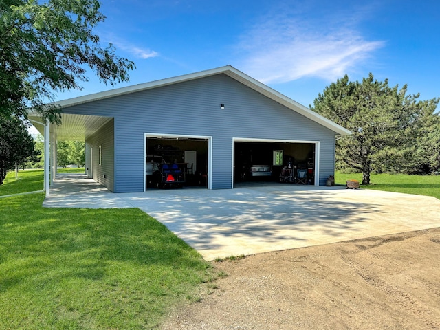 garage with a yard