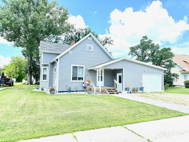 view of front facade with a front yard and a garage