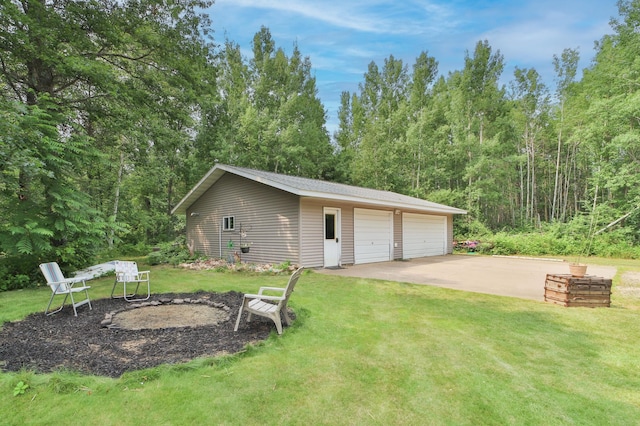 garage with a yard