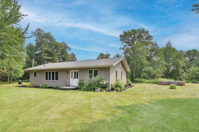 view of front of home featuring a front lawn