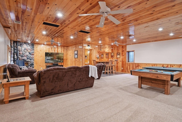 recreation room featuring wooden ceiling, a wood stove, pool table, and ceiling fan