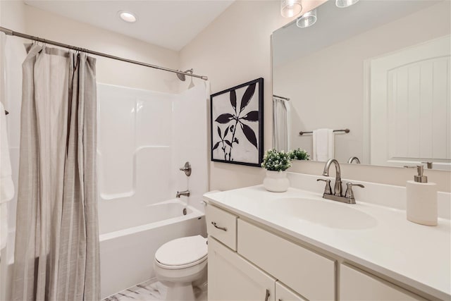 full bathroom with toilet, vanity, and shower / tub combo with curtain