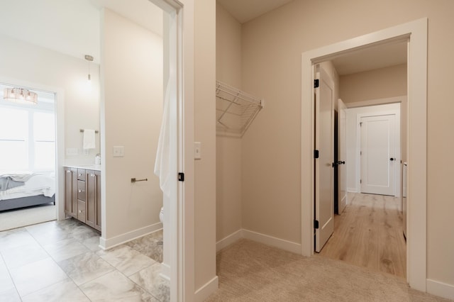 interior space featuring light colored carpet