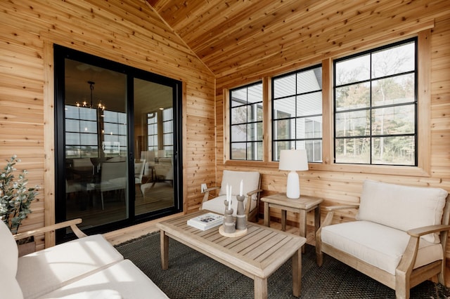 sunroom featuring wooden ceiling and vaulted ceiling