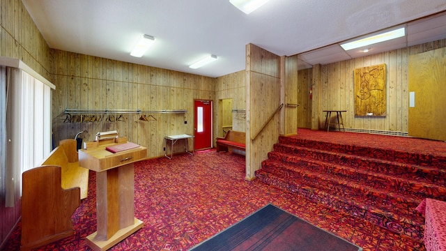 misc room with wooden walls