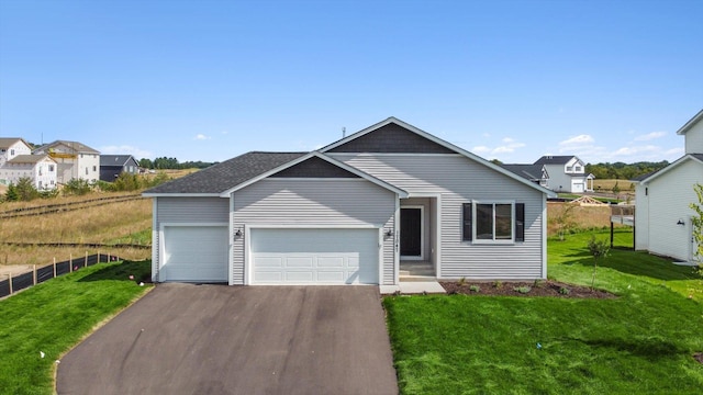 single story home featuring a front yard and a garage