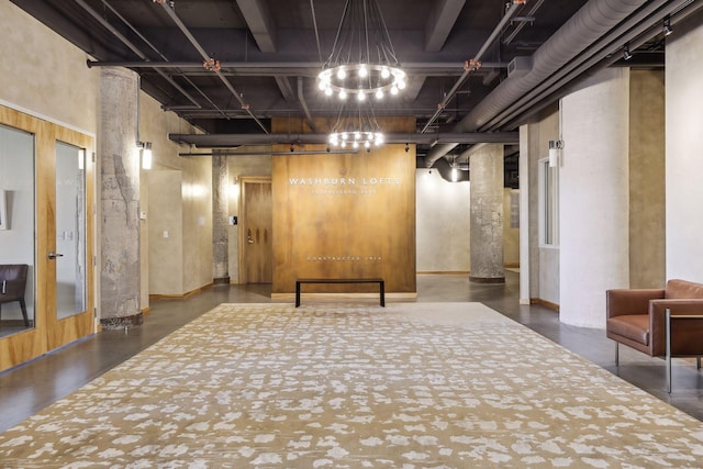 basement featuring a chandelier