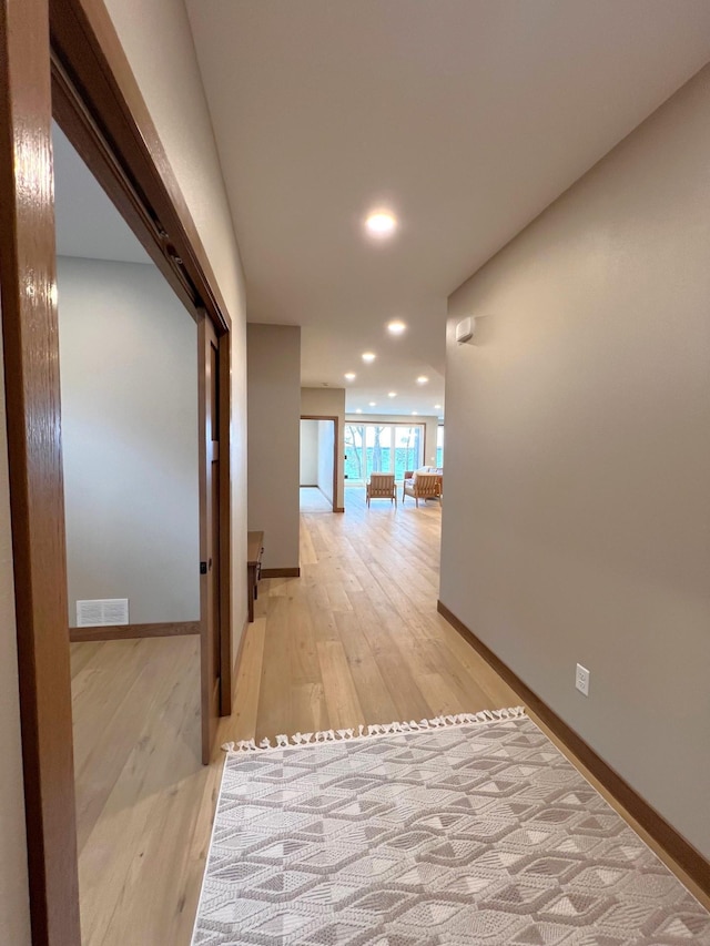 hall featuring light hardwood / wood-style flooring