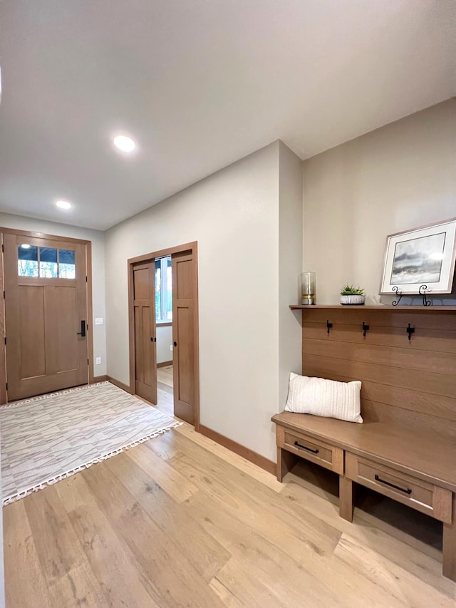 foyer with light wood-type flooring