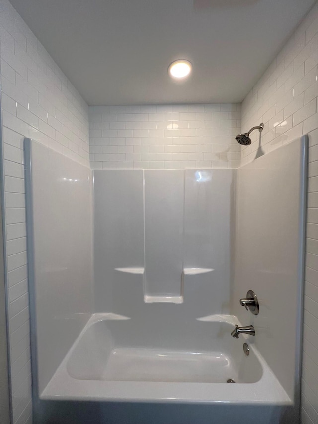 bathroom featuring shower / washtub combination