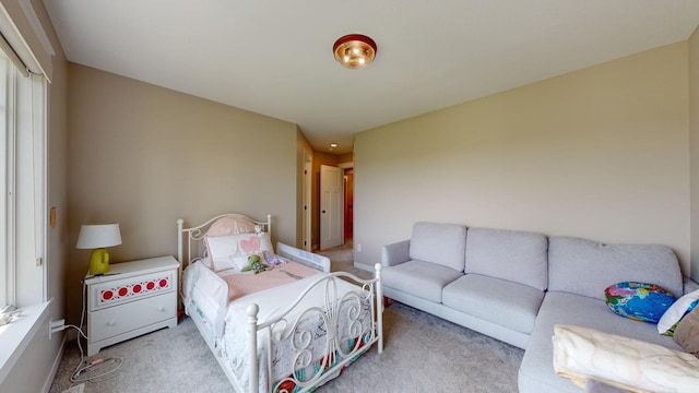 bedroom with light carpet