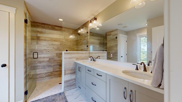 bathroom with vanity and an enclosed shower